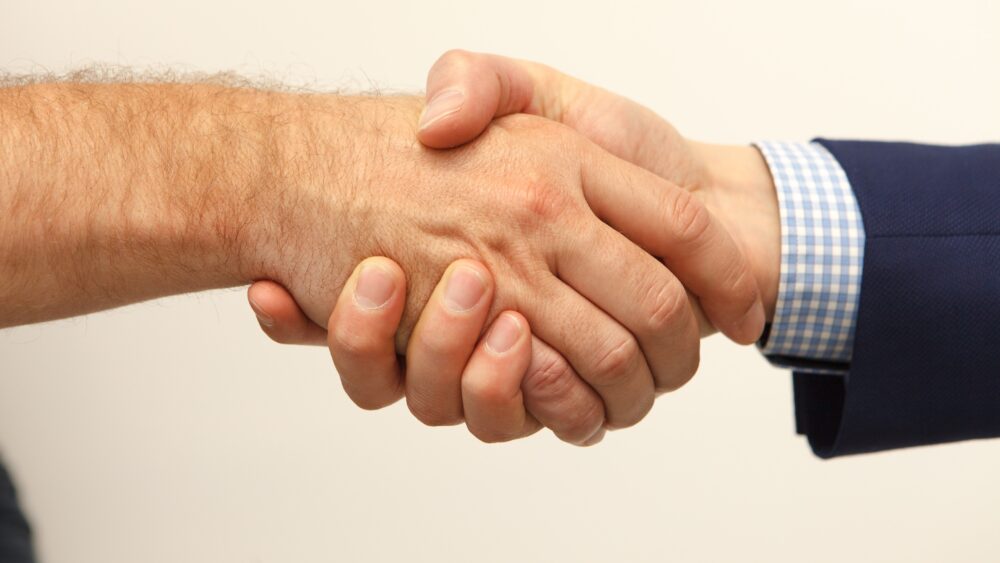 Zusammenarbeit, Vertrauen, Handshake