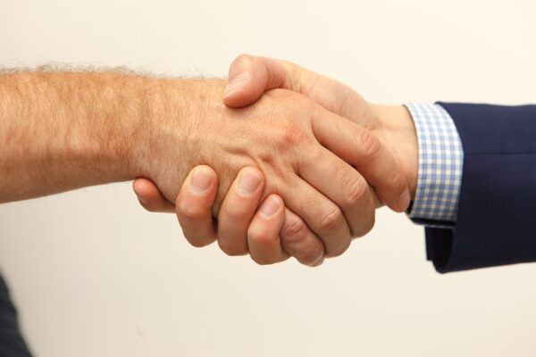 Zusammenarbeit, Vertrauen, Handshake